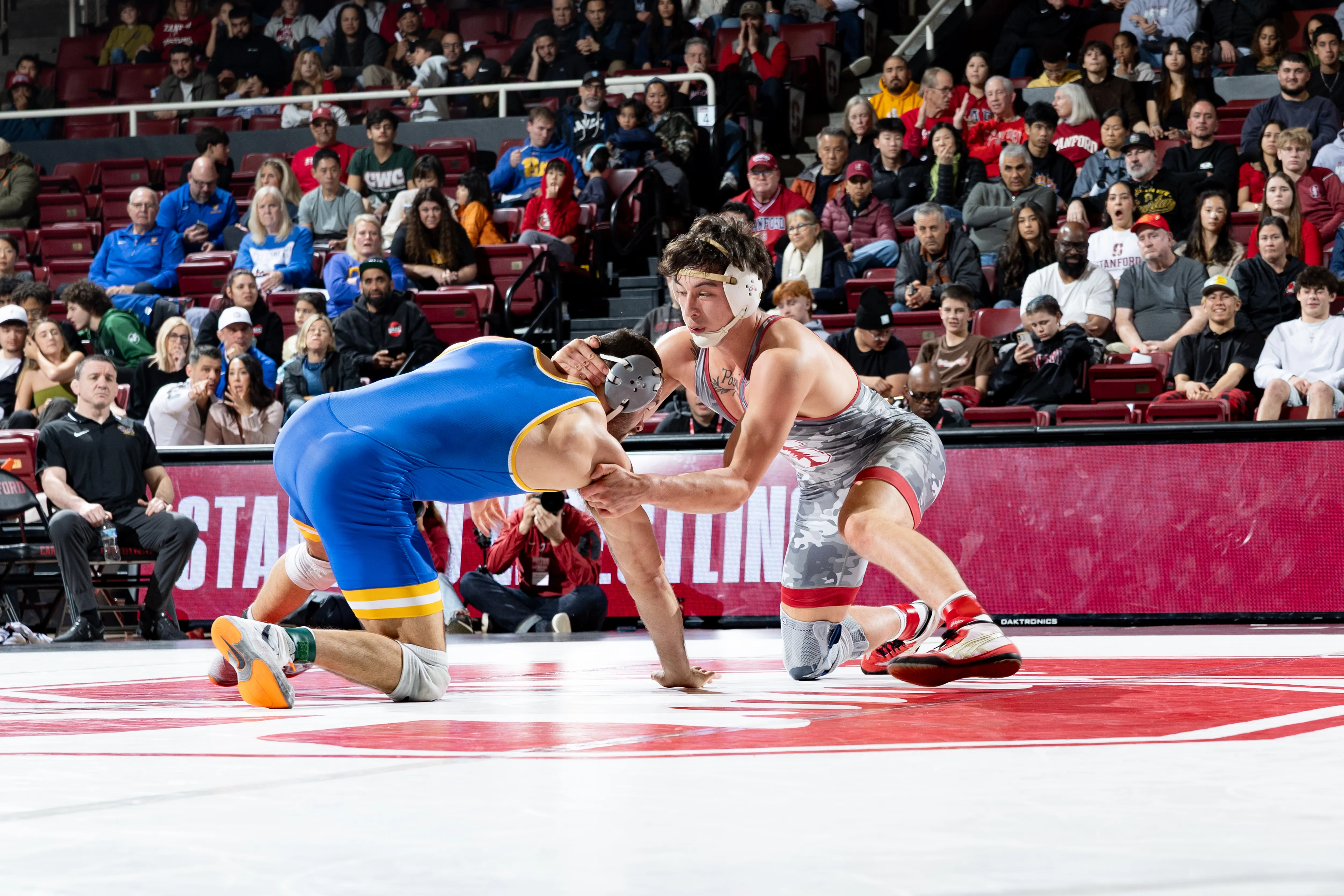 Freshman Angelo Posada in a match versus Pitt's Mac Stout