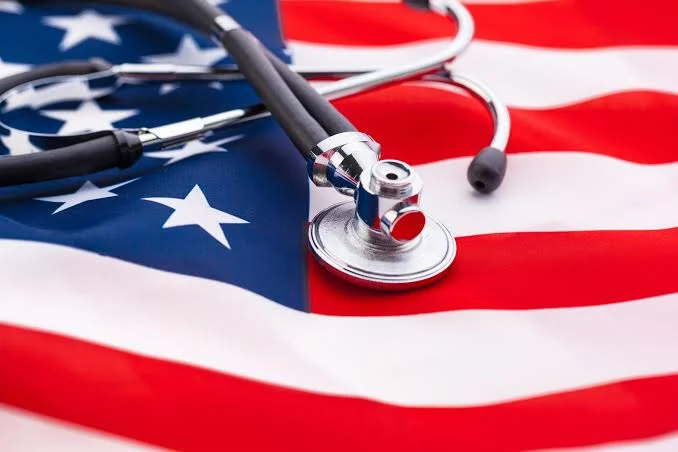 A stethoscope resting on an American flag